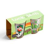 Packaging of two shot glasses with a cartoon leprechaun on a green background