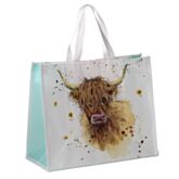 Tote bag with a design of a highland cow on a light background